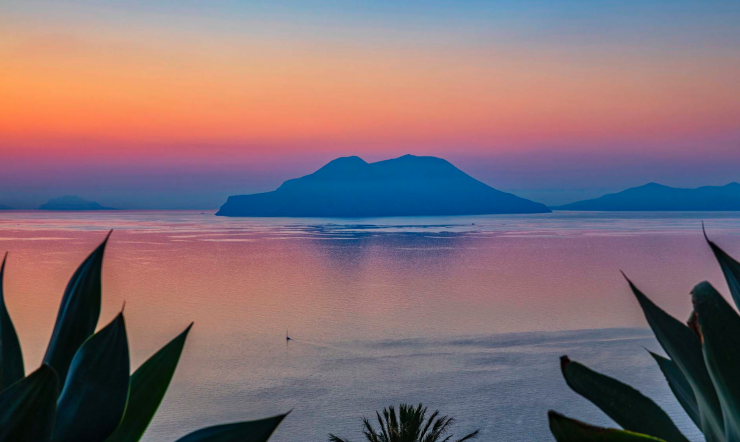 View of tropical island at sunset, dream wedding location.